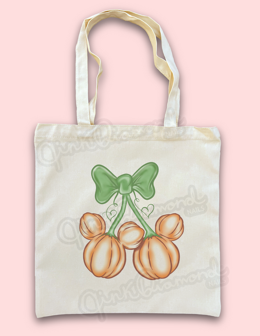 Pumpkin garden bow canvas tote bags